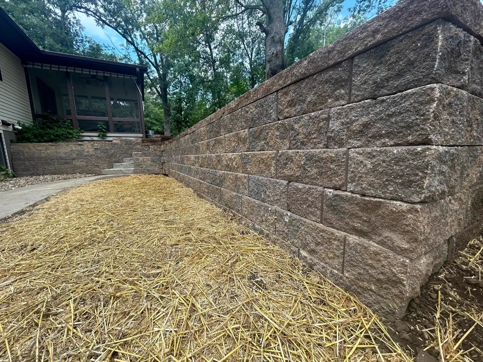 Tall block retaining wall on a residential property